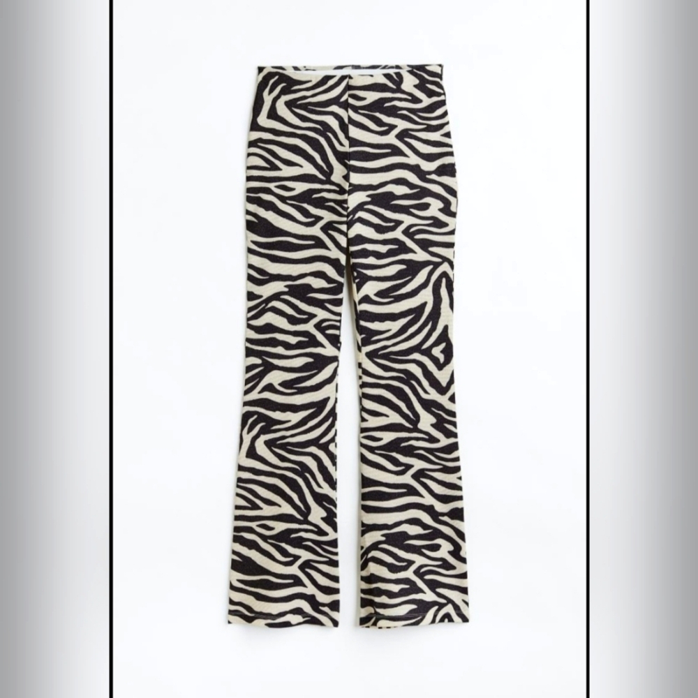 Glittery flared leggings zebra print